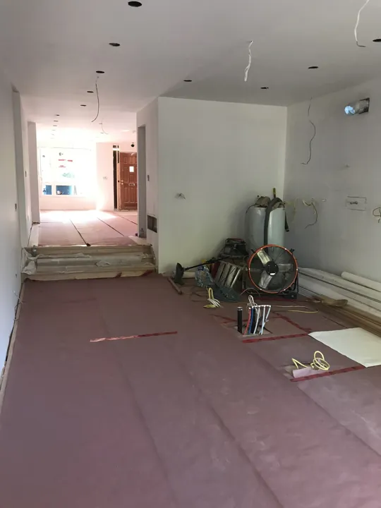 Kitchen — plumbing and wall preparation before cabinetry