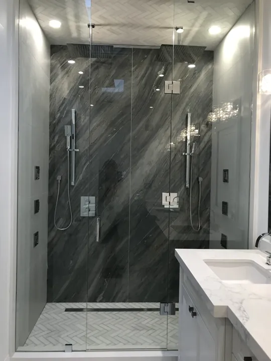 Completed bathroom — glass shower enclosure