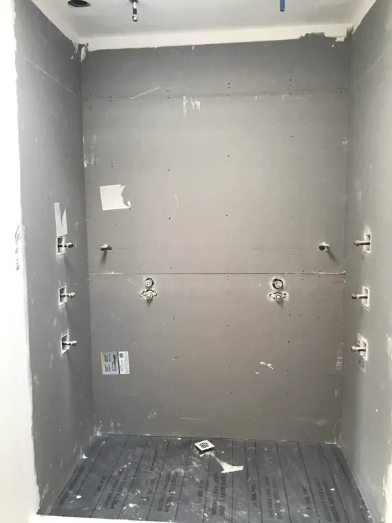 Shower — waterproof wall preparation and plumbing rough-ins